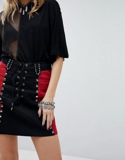 Sacred Hawk Studded Mini Skirt | red and black colour block skirts - flipped