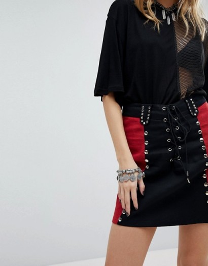 Sacred Hawk Studded Mini Skirt | red and black colour block skirts