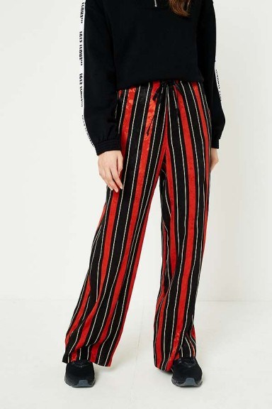 UO Rust and Navy Striped Satin Puddle Trousers – stripe print pants - flipped