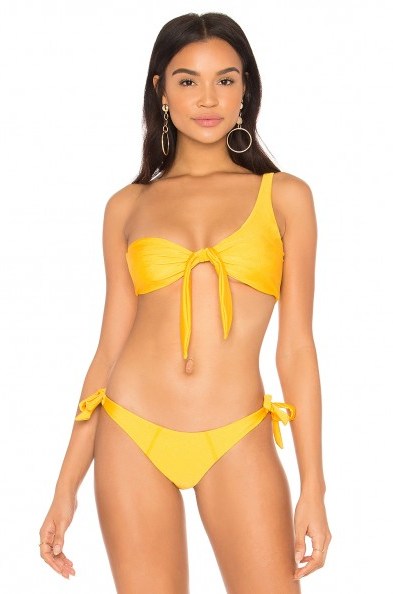 LOVEWAVE THE IMAN BIKINI TOP in GOLDEN & THE BEVERLY BIKINI BOTTOM, as worn by Romee Strijd on Instagram, 5 February 2018. Celebrity yellow bikinis | star style swimwear - flipped