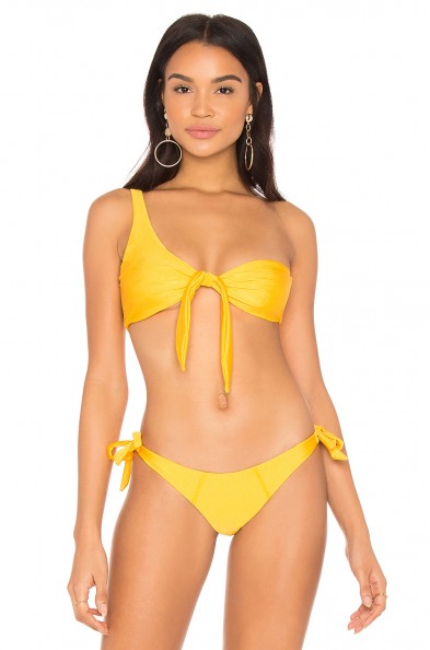 LOVEWAVE THE IMAN BIKINI TOP in GOLDEN & THE BEVERLY BIKINI BOTTOM, as worn by Romee Strijd on Instagram, 5 February 2018. Celebrity yellow bikinis | star style swimwear