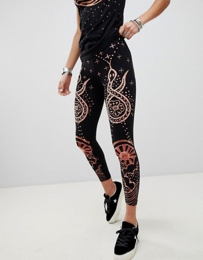 Anna Sui Rising Sun and Snake Leggings in black - flipped
