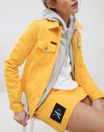 Calvin Klein Jeans Archive Denim Trucker Jacket in Spectra Yellow - flipped