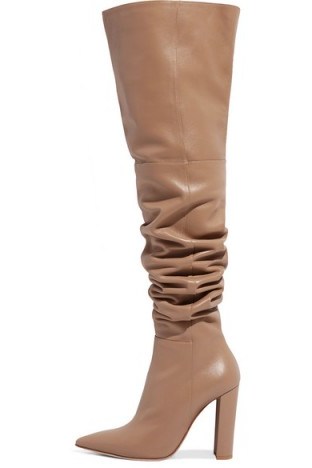 Chrissy Teigen beige slouchy high heeled boots, GIANVITO ROSSI 100 leather over-the-knee boots in Bisque, out in New York City, 27 March 2018. Celebrity street style | star fashion - flipped