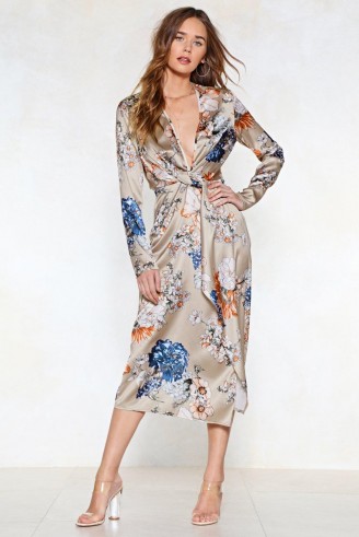 Got Your Dress in a Twist Floral Dress. NUDE PLUNGE FRONT DRESSES
