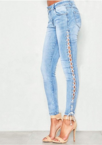 MISSYEMPIRE Helen Denim Light Wash Lace Up Skinny Jeans | side tie skinnies