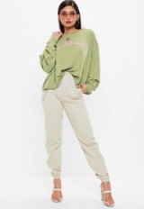 MISSGUIDED khaki calabasas cropped sweatshirt – slouch green slogan sweat tops