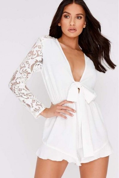 CHARLOTTE CROSBY WHITE TIE FRONT LACE SLEEVE PLAYSUIT – plunging neckline romper - flipped