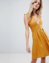 Faithfull Button Front Mini Dress in Plain Marigold – yellow – plunge front – summer style