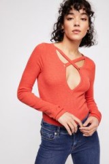 Free People Hayley Long Sleeve Top in Red | plunging cross front tops