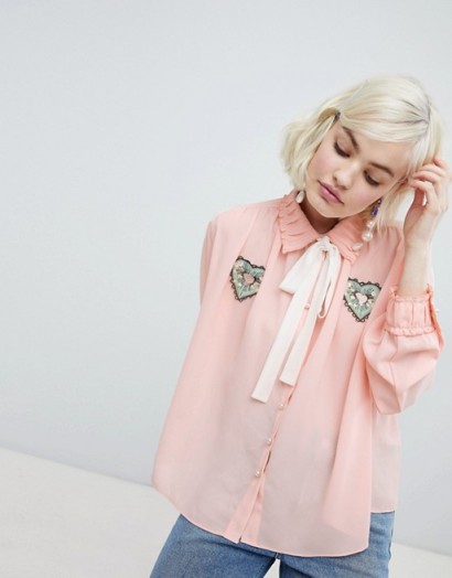 Sister Jane blouse with ribbon tie and heart patch detail in peach – vintage look fashion