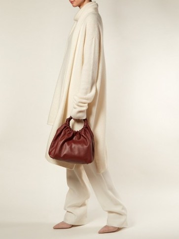 THE ROW Circle-handle leather bag / chic burgundy handbag - flipped