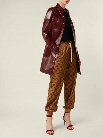 GUCCI GG-printed brown jersey track pants ~ sports luxe clothing - flipped