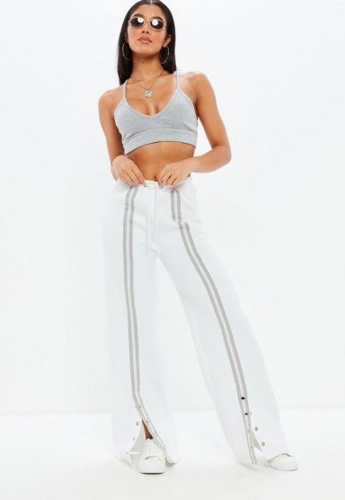Missguided jersey popper front stripe joggers | white sports pants - flipped