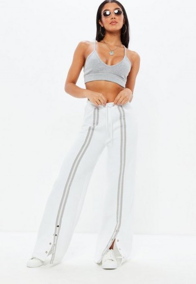 Missguided jersey popper front stripe joggers | white sports pants