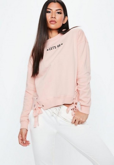 Missguided pink lets go slogan lace up sweatshirt