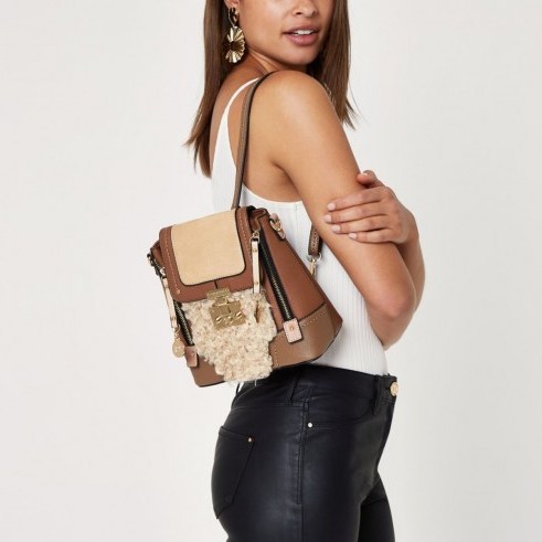River Island faux fur lock front backpack | neutral tone backpacks - flipped