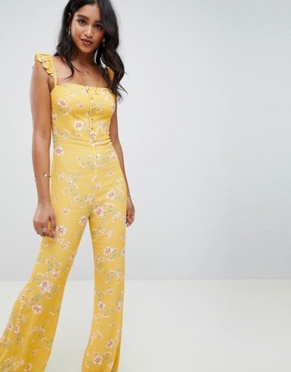 Flynn Skye bloom print jumpsuit in touch of honey | yellow floral ruffle strap jumpsuits - flipped