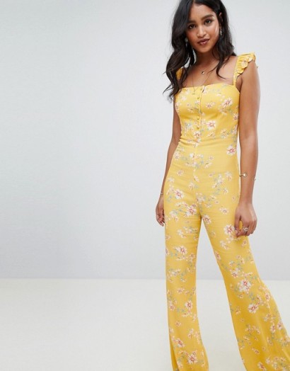 Flynn Skye bloom print jumpsuit in touch of honey | yellow floral ruffle strap jumpsuits
