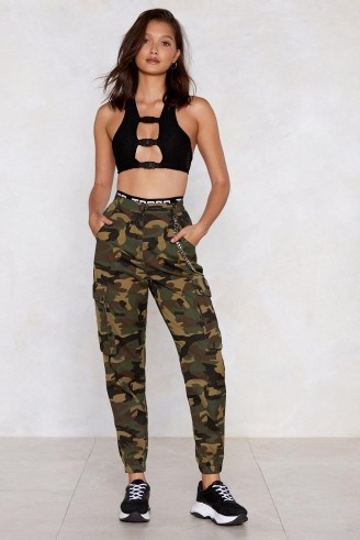 Nasty Gal Action Woman Camo Pants in Khaki | cuffed camouflage trousers - flipped