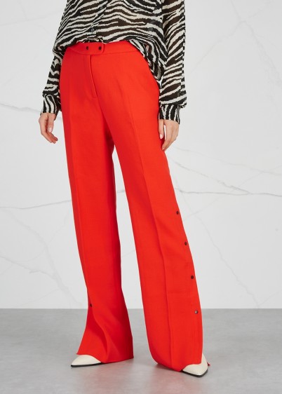 BRØGGER Gurli red wide-leg wool trousers | stud-fastening hems