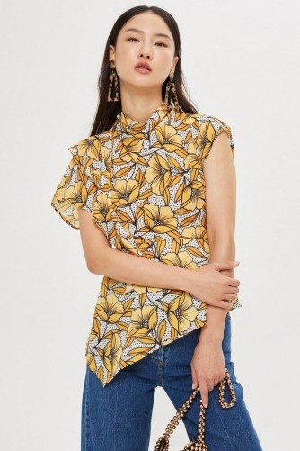 TOPSHOP Spot and Yellow Floral Print Ruffle Blouse / open back / one sleeve / high neck / asymmetric in design - flipped