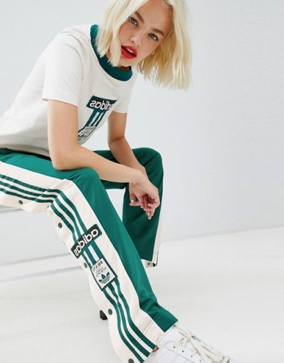 adidas Originals Three Stripe Popper Pant With Vintage Logo In Noble Green – sporty looks – sports pants - flipped