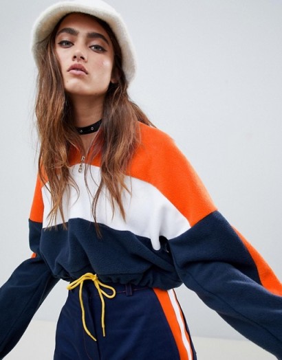 The Ragged Priest cropped fleece with half zip in orange – sporty colourblock top