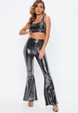 Missguided black sequin disc flare trousers and top co ord set | glamorous sequinned party fashion