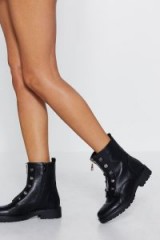 NASTY GAL Army Of Me Faux Leather Boot in black – front zip studded boots