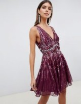 ASOS DESIGN scattered sequin mini skater dress in oxblood | sleeveless fit and flare party dresses