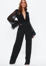 Missguided black feather jumpsuit | glamorous partywear