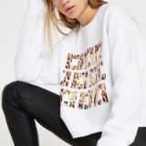 River Island White ‘luxe’ leopard print sweatshirt | slogan sweat top