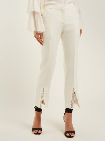 ALEXANDER MCQUEEN Lace-trimmed slit-cuff wool-blend trousers ~ luxe pants