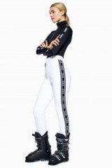 Topshop SNO Logo Fitted Trousers in White | ski pants | stylish winter sports fashion