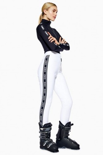 Topshop SNO Logo Fitted Trousers in White | ski pants | stylish winter sports fashion - flipped