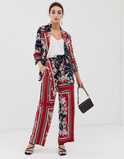 River Island wide leg trousers in scarf print in red. FLORAL AND STRIPE PRINTS - flipped
