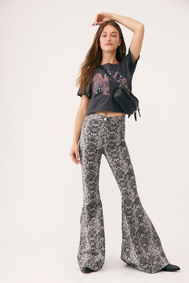 FREE PEOPLE Printed Penny Pull-On Flare Jeans in Chic Snake | extreme flared jeans - flipped