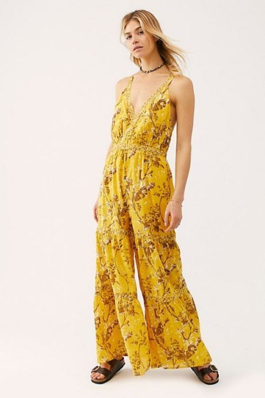 FREE PEOPLE Caicos Jumpsuit in Sundrop | yellow deep V-neckline jumpsuits - flipped