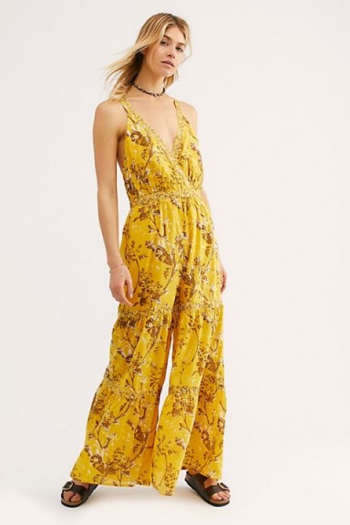 FREE PEOPLE Caicos Jumpsuit in Sundrop | yellow deep V-neckline jumpsuits