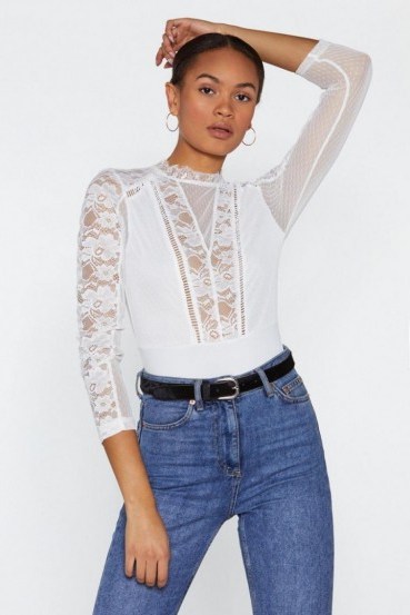 Nasty Gal Call Back Ladder Lace Bodysuit in White | semi sheer panel bodysuits - flipped