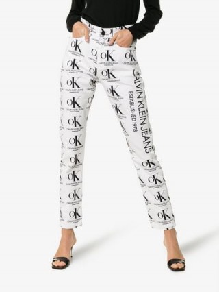 Calvin Klein Jeans Est. 1978 Ok Logo Print High Waist Jeans in White and Black ~ slogan / logo denim