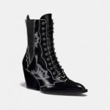 COACH Lace Up Bootie With Western Stitch in BLACK | chunky heeled boots worn with prairie dress