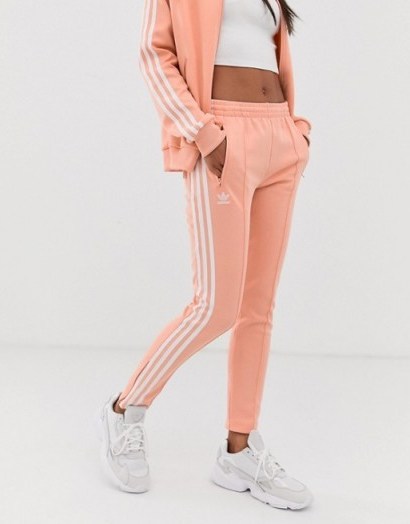 adidas Originals adicolor three stripe cigarette pant in pink – girly sports pants - flipped