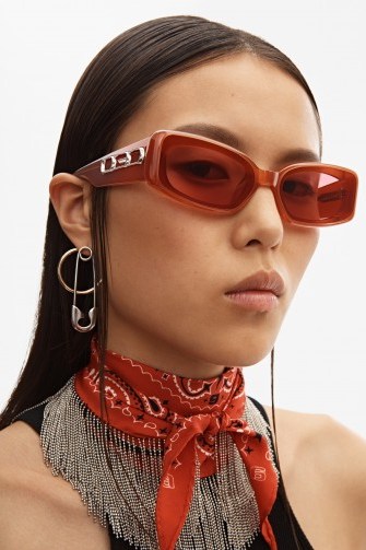 Bella Hadid red sunglasses worn while out in Paris, Alexander Wang ceo sunglasses, 23 March 2019 | celebrity street style eyewear - flipped