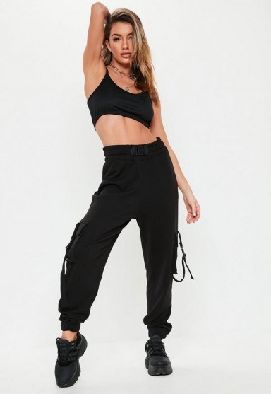 Missguided black seat belt jersey cargo trousers | strap detail pants - flipped