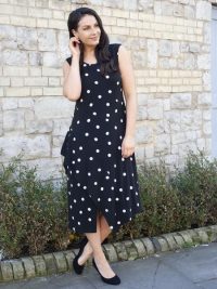 Chesca Direct Black & Ivory Spot Print Curved Panel & Flounce Trim Jersey Dress | Panels flatter your silhouette