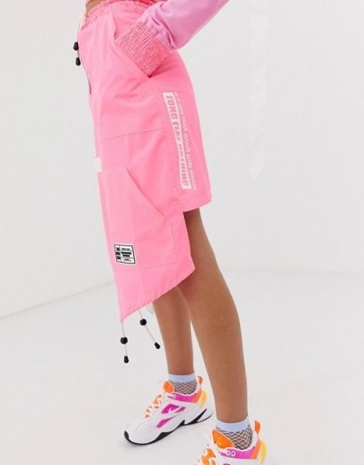 DB Berdan woven skirt with zip in pink | bright dip hem skirts - flipped