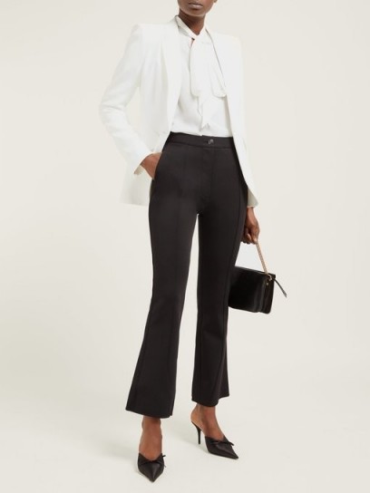GIVENCHY Stitched-front kick-flare trousers in black ~ stylish tailored pants