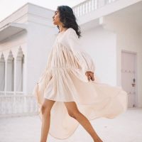 To The Moon & Back by A Perfect Nomad | Wolf & Badger | ruffled tiered silhouette and an sweeping dropped hem